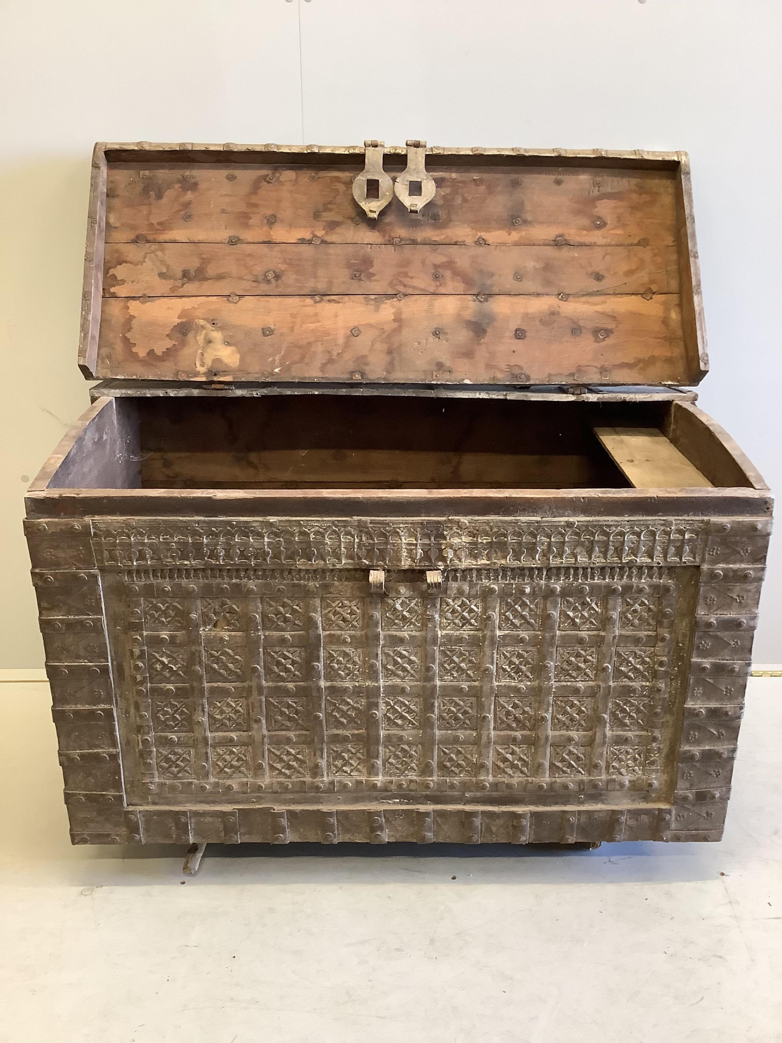 An Indian iron bound domed hardwood trunk, width 104cm, depth 62cm, height 71cm